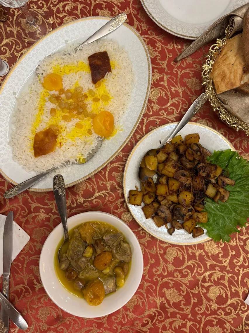 Saffron plov with dried apricot and raisin, served with lamb and chestnut stew at Shirvanshah in Baku