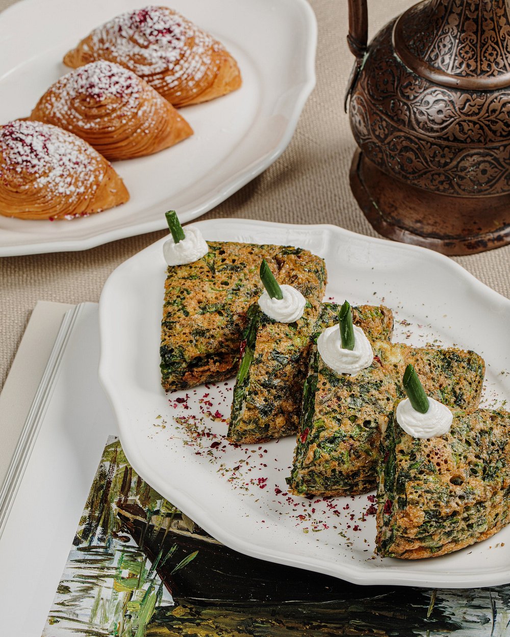 Azeri breakfast at Merci Baku — kükü herb omelette, warm pastries and traditional tea